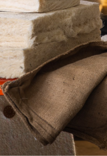 Stacks of Sisal blocks material sitting on top of brown sacks