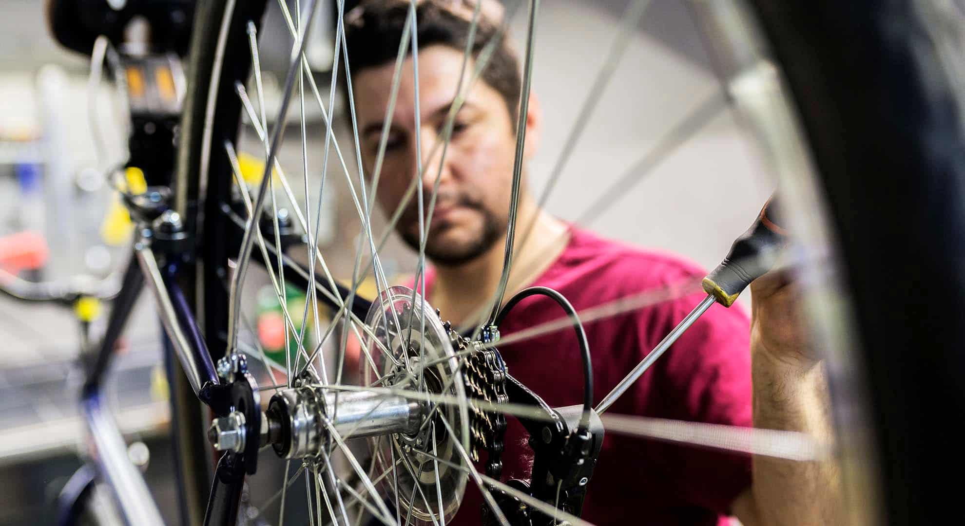 A person working on a bike