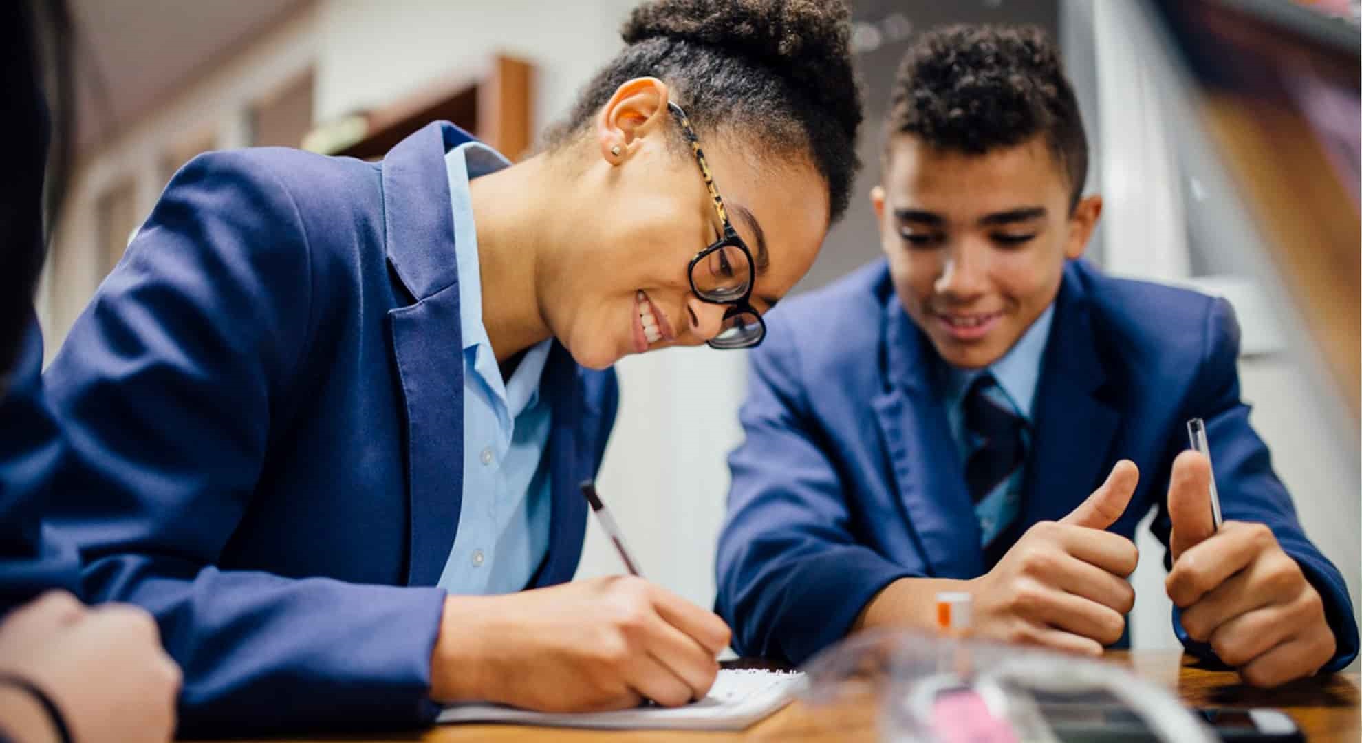 school kids collaborating on a project